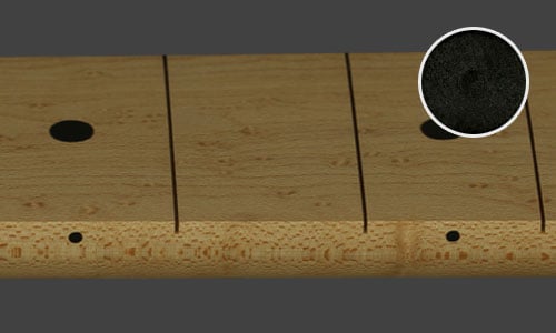 Standard on lighter color fretboards